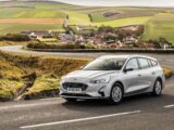 A Ford Focus Estate parked up with a picturesque view in the background