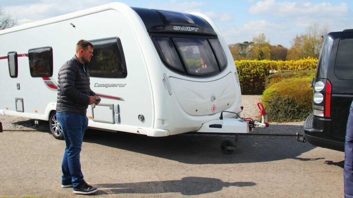 Using a motor mover to manoeuvre a caravan