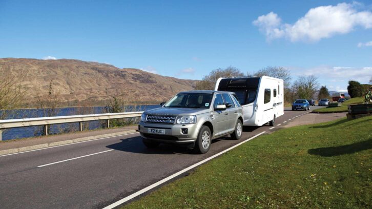 A car towing a caravan