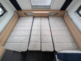 The double bed in the lounge
