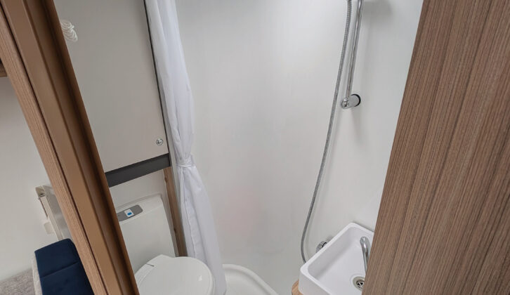 The shower in the corner washroom