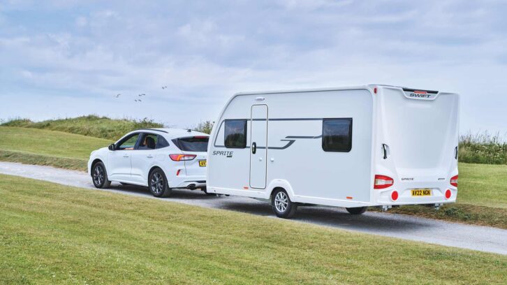 A Sprite being pulled by a car
