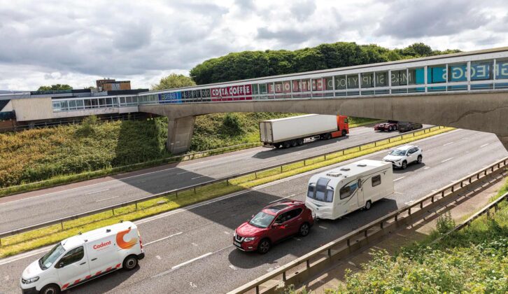 A caravan being towed on a motorway