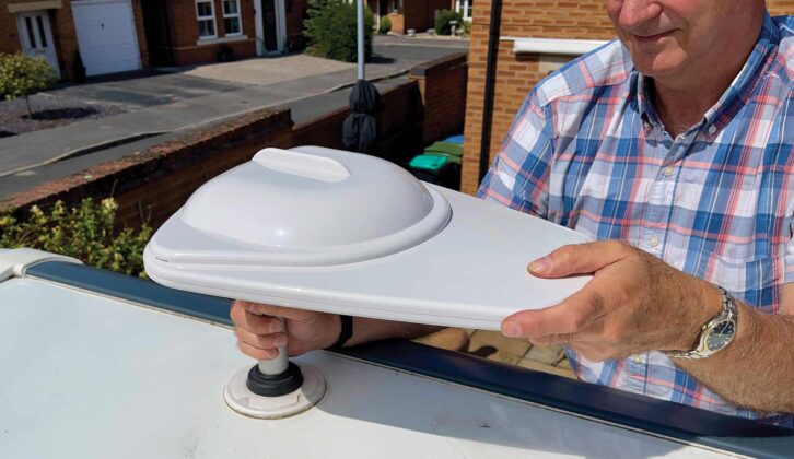 Mounting the new antenna on the roof of the caravan