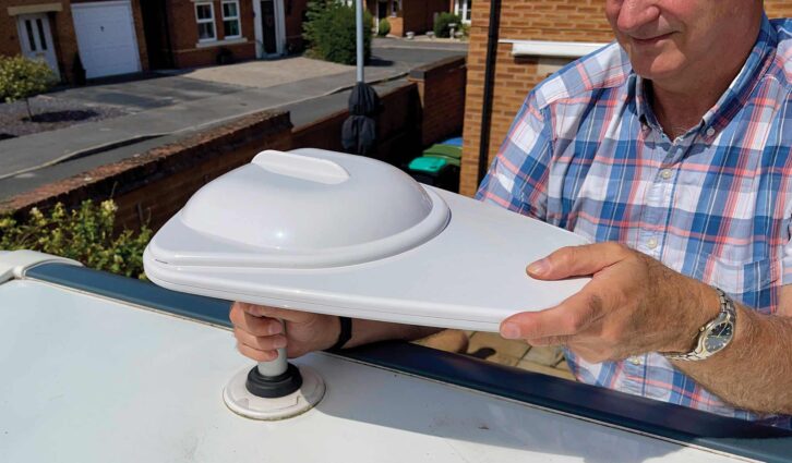 Mounting the new antenna on the roof of the caravan