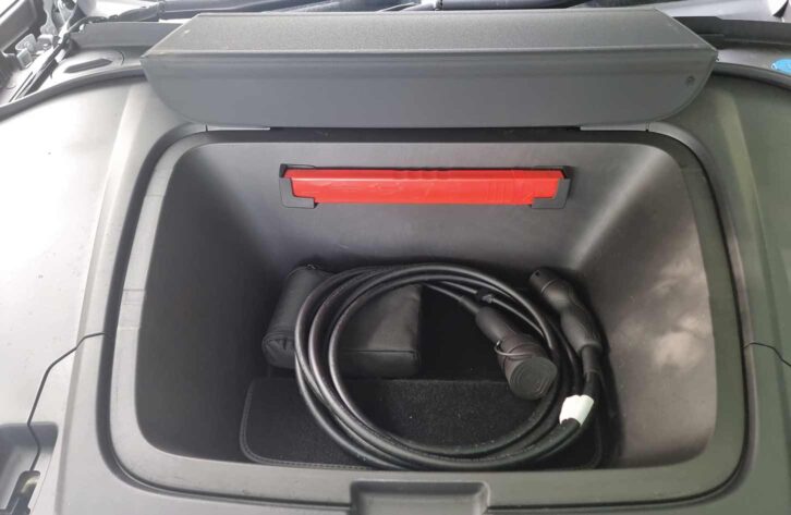 The charging cable in the 'frunk'