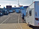 Cars, caravans and motorhomes queuing for the ferry