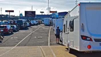 Cars, caravans and motorhomes queuing for the ferry