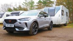 A used Cupra Formentor hitched up to a caravan