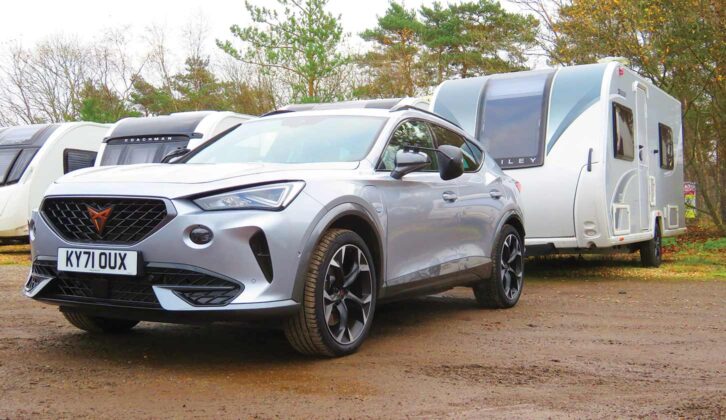 A used Cupra Formentor hitched up to a caravan