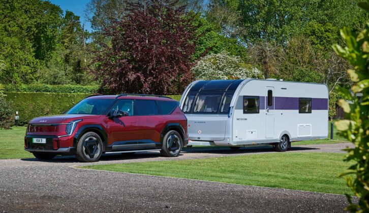 An Adria caravan hitched up to a Kia