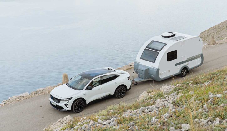 The Action being towed by a car