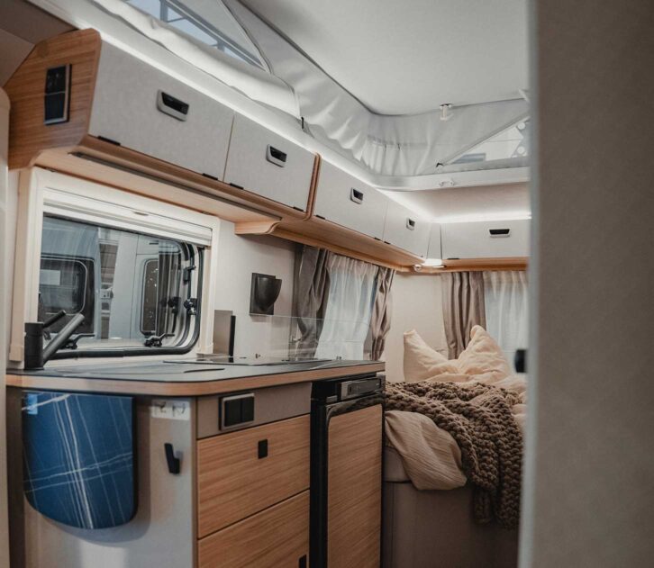 The kitchen in one of the Silver Edition caravans, including overhead lockers