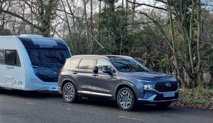 A Hyundai Santa Fe hitched up to a caravan