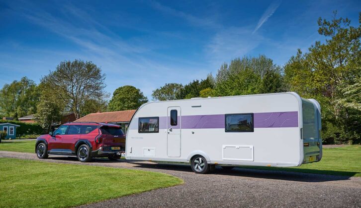 An Adria caravan hitched to a Kia