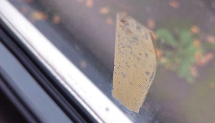 A masking tape mark on the window