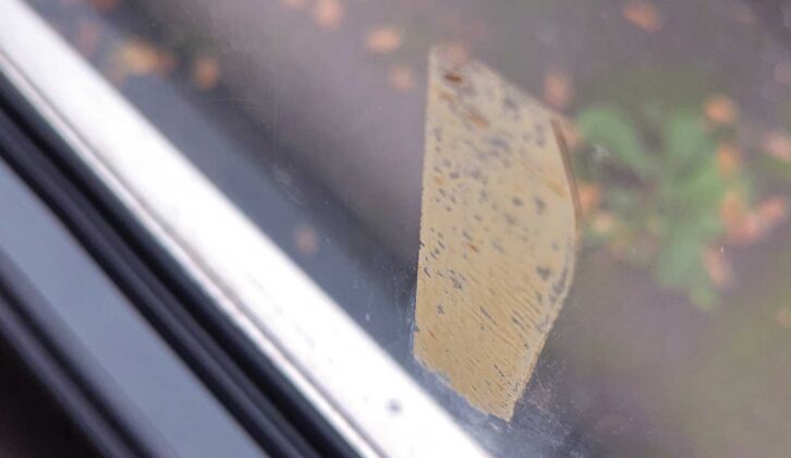 A masking tape mark on the window