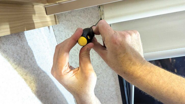 Screwing it back into place