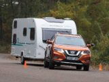 A Nissan X-Trail Mk3 towing a caravan