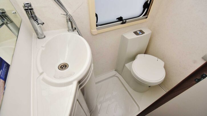 The compact corner washroom