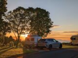The sun setting at Culzean Castle Camping and Caravanning Club Site