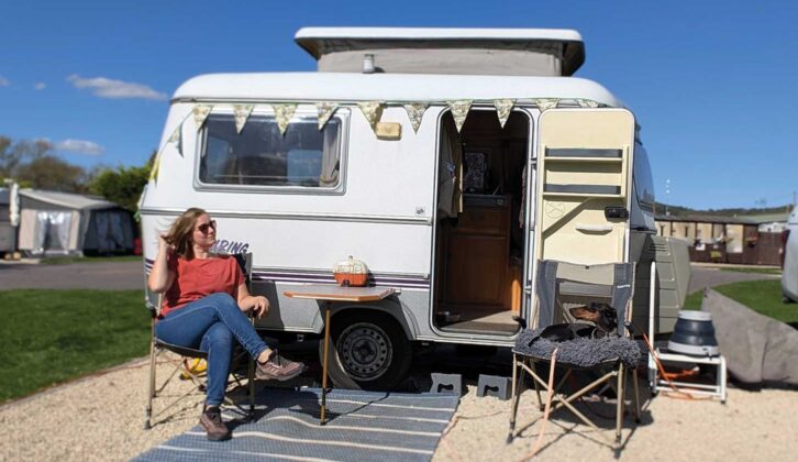 Lottie relaxing in front of her Eriba