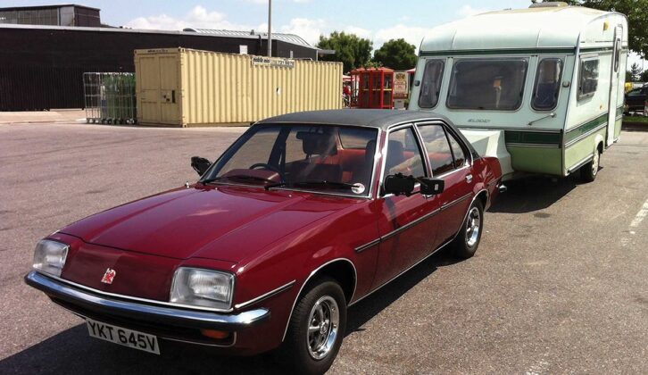 The Vauxhall Cavalier Mk1 hitched up to a caravan