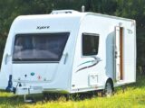 A caravan outdoors on a sunny day
