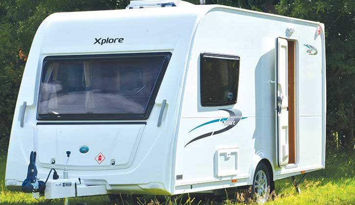 A caravan outdoors on a sunny day