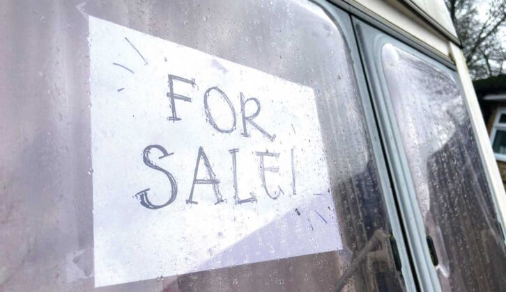 A 'for sale' sign in a window