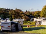 Caravans, tents and motorhomes pitched up at Park Cliffe