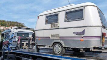 The Eriba on the back of a pick-up truck