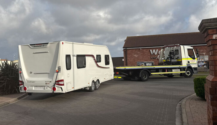 The caravan from the rear, hitched up to a lorry