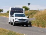 A Skoda Karoq hitched up to a caravan