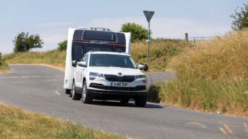 A Skoda Karoq hitched up to a caravan