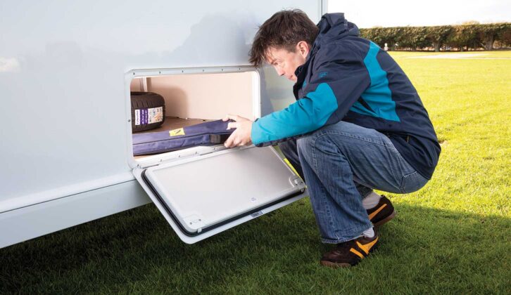 A man emptying an external locker
