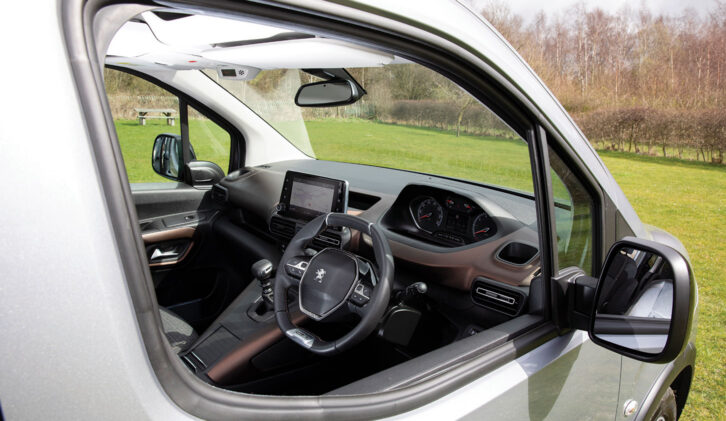 Looking through the driver's window into the cabin