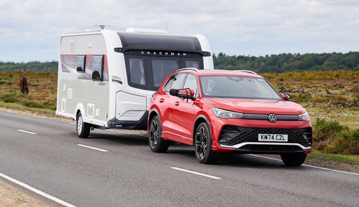 A Coachman Laser 480 Xtra being towed
