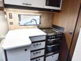 The kitchen, with a microwave overhead