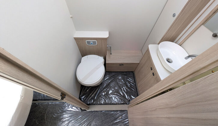 The toilet and washbasin in the washroom