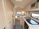 The side kitchen and the opposite washroom