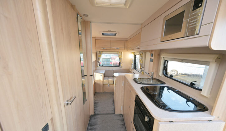 The side kitchen and the opposite washroom
