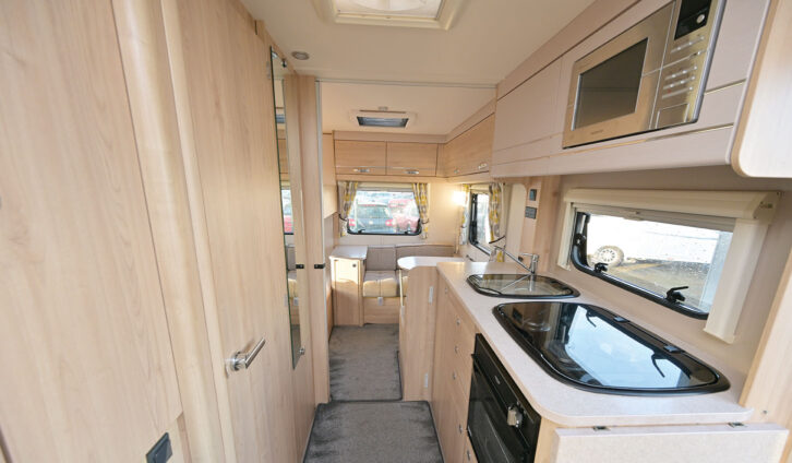 The side kitchen and the opposite washroom