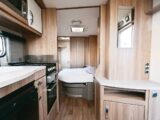 Looking towards the bed at the rear of the caravan
