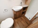 The toilet, washbasin and shower cubicle in the Sprite