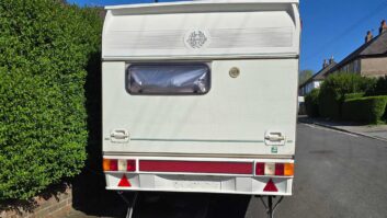 The caravan from the rear on the street