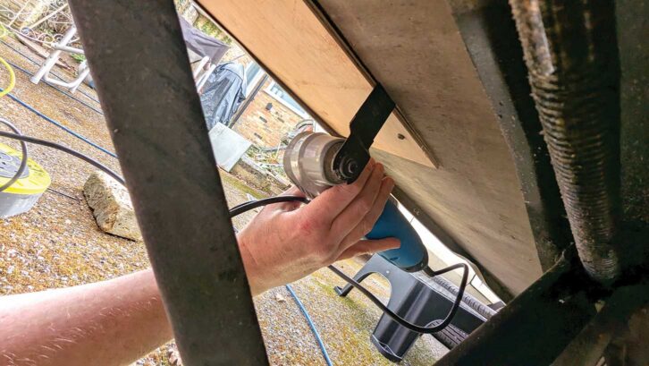 Pinning the patch in place and cutting it flush with the edges