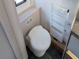 The toilet in the washroom