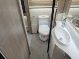 The Conqueror's washroom includes a large mirror and a ladder radiator