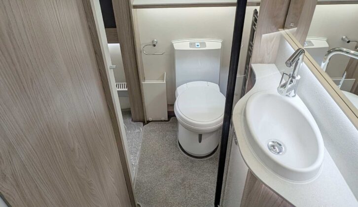 The Conqueror's washroom includes a large mirror and a ladder radiator